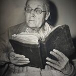 elderly woman reading bible