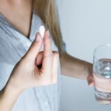 woman taking sumatriptan